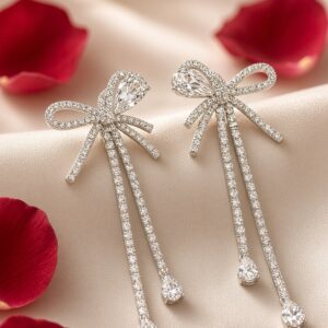 The Monecu Coquette Bow And Pear Drop Earrings-Platinum Finish