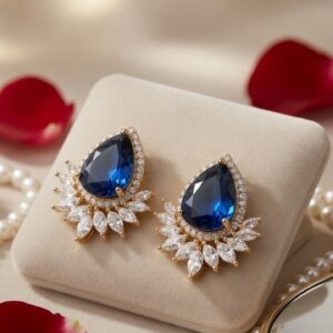 The Royal Sapphire Pear Halo Sunburst Studs-Gold Finish