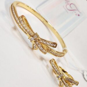 Love knot Bracelet Golden Finish combo with Ring (size Adjustable)