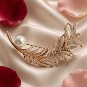 The Aurelia Curved Feather Pearl Brooch-Gold Finish