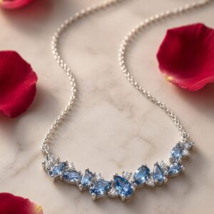 The Celestia Aquamarine Marquise And Pear-Cut Cluster Pendant Chain-Platinum Finish