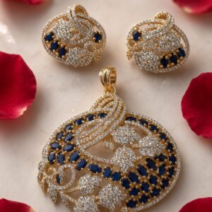 The Sapphire Sovereign Oval Filigree Floral Pendant Set-Gold Finish