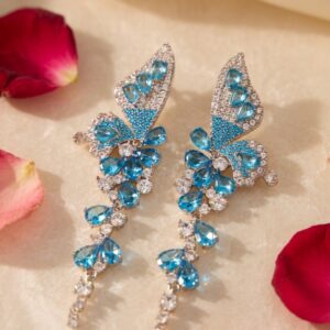 Vivid Blue Topaz And Crystal Wing Zirconia Earrings-Platinum Finish