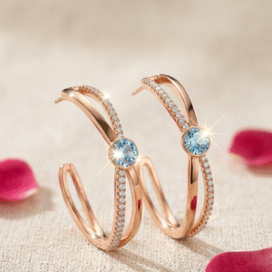 The Aurelia Aquamarine Cross Hoops-Gold Finish